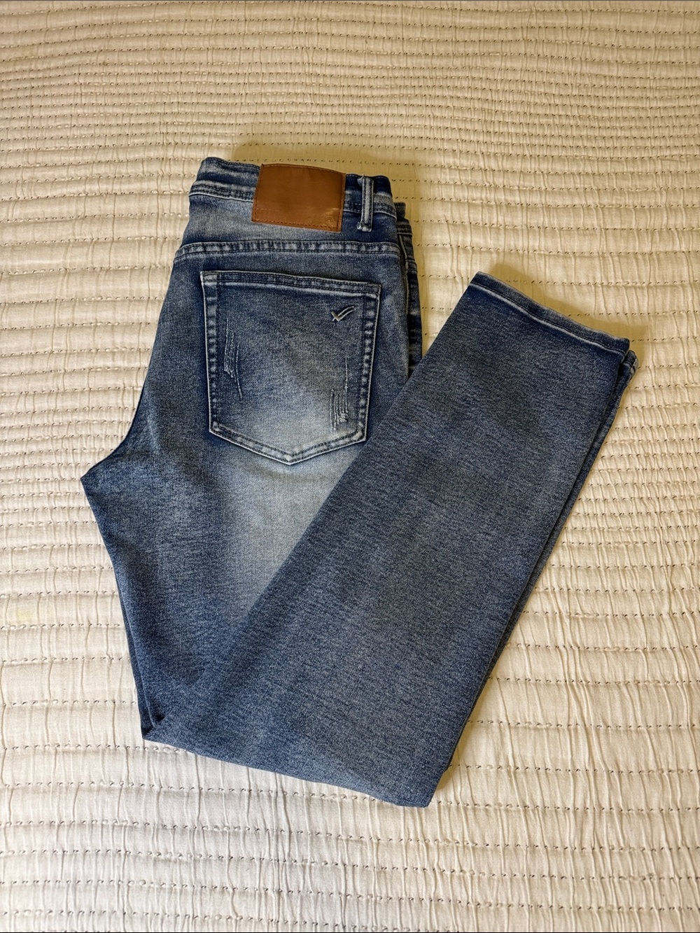 William Rast Men's Skinny Denim Jeans in Faded Blue with Brown Patch